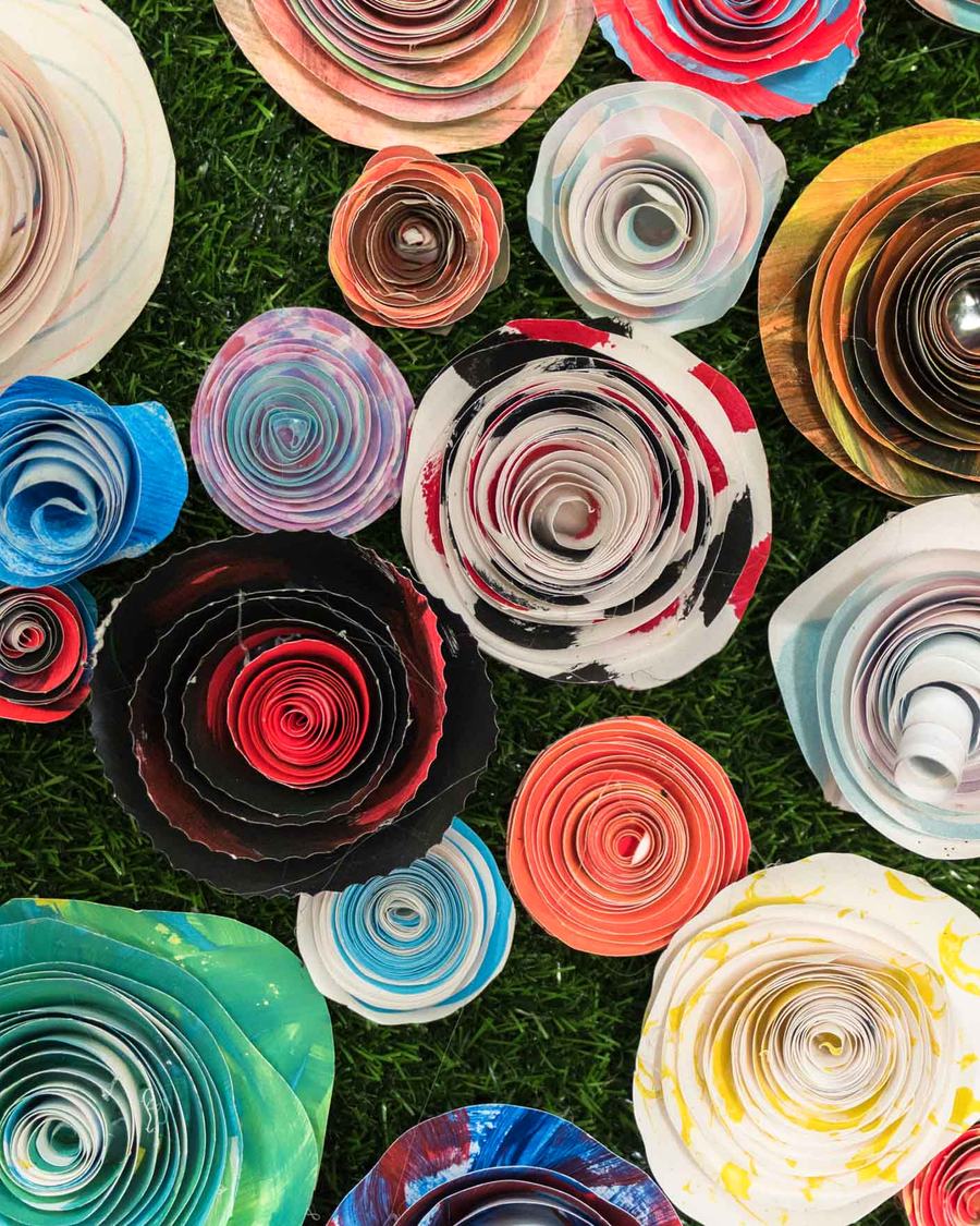Paper flowers made by young people in a HUG Project activity session.
